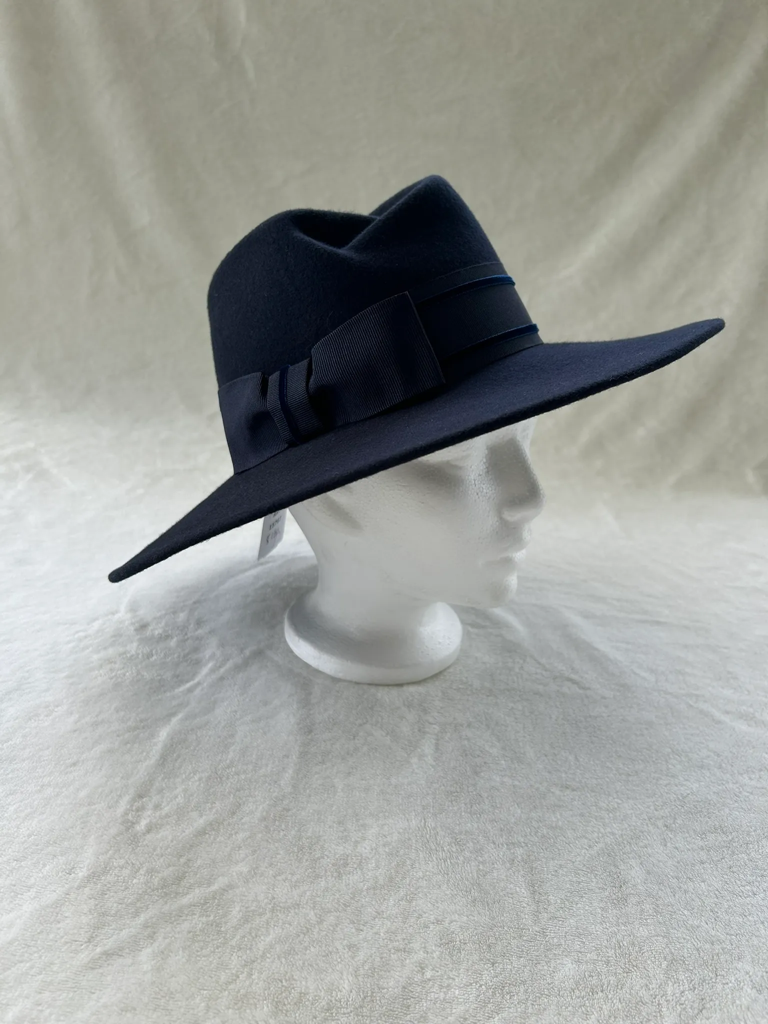 A ladies’ hat with a soft brim from the Cherish shoppe, number 130