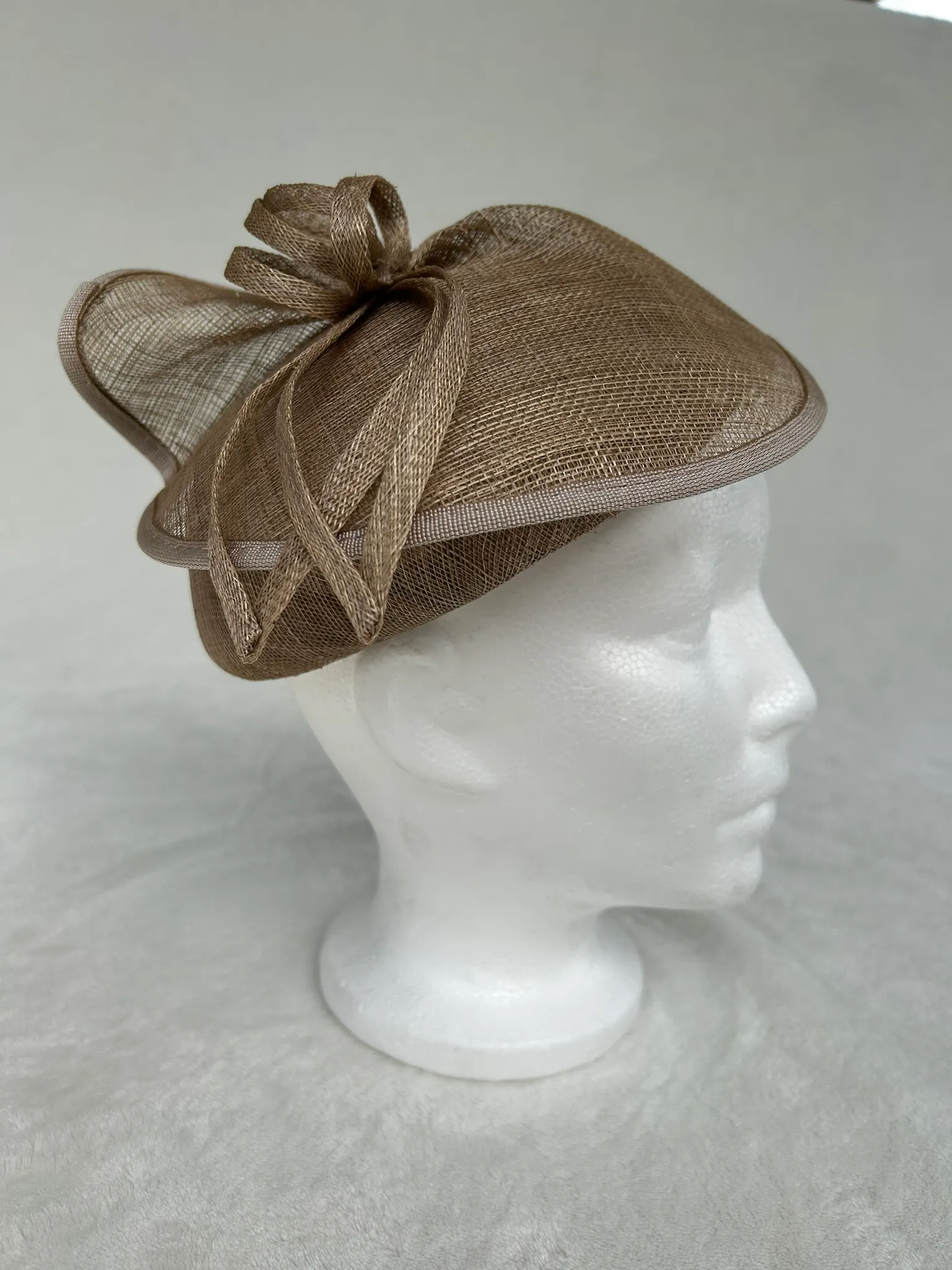 A ladies’ hat with a soft brim from the Cherish shoppe, number 306