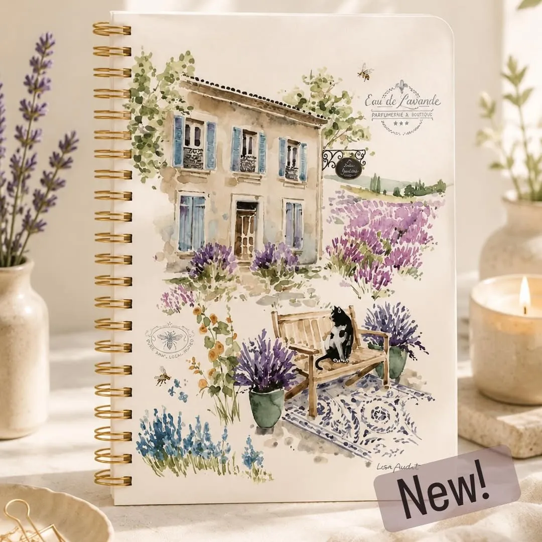 Watercolour notebook with a lavender-field country house and gold spiral binding