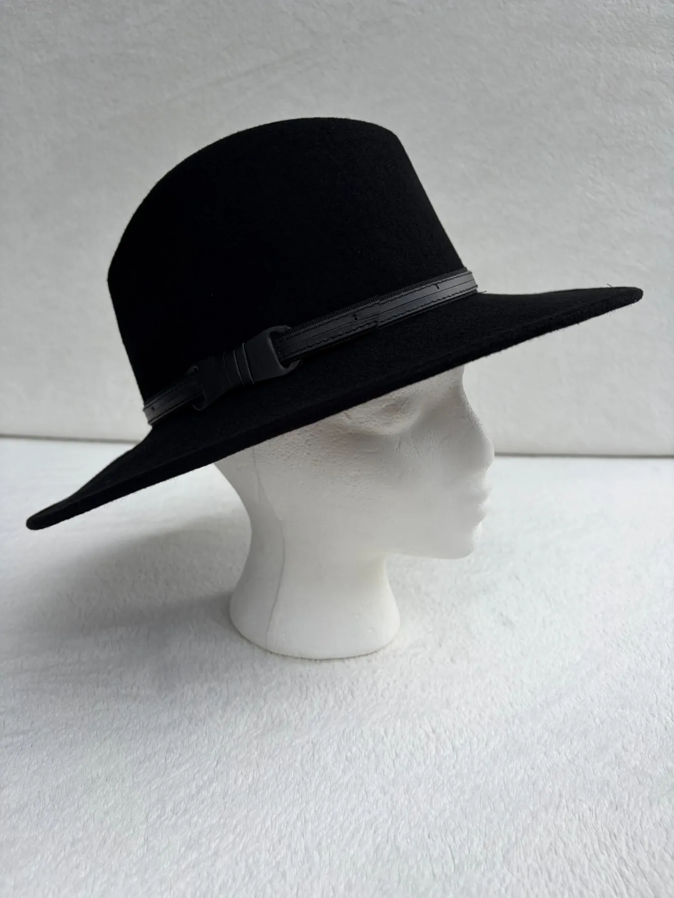 A black felt cowboy hat from Hats by Cherish, number 137