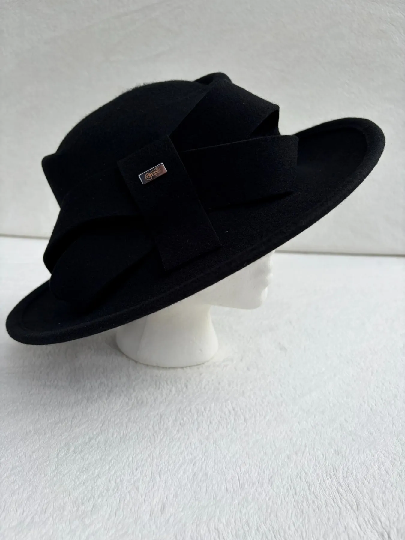 A black felt wide-brimmed hat from Hats by Cherish, number 162