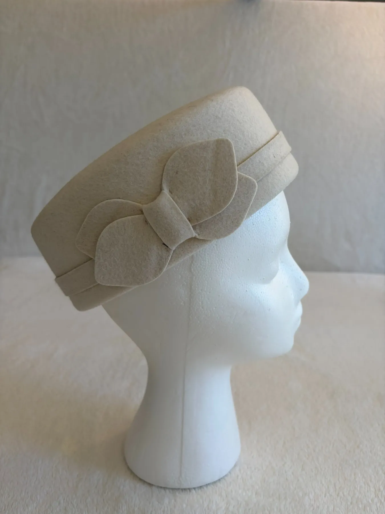 A cream felt pillbox hat for kids from Hats by Cherish, number 190