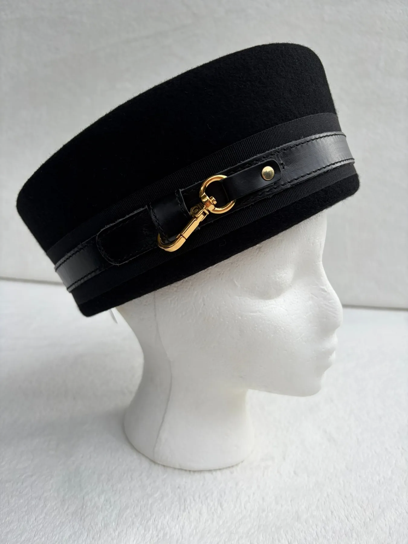 A black felt pillbox hat from Hats by Cherish, number 338