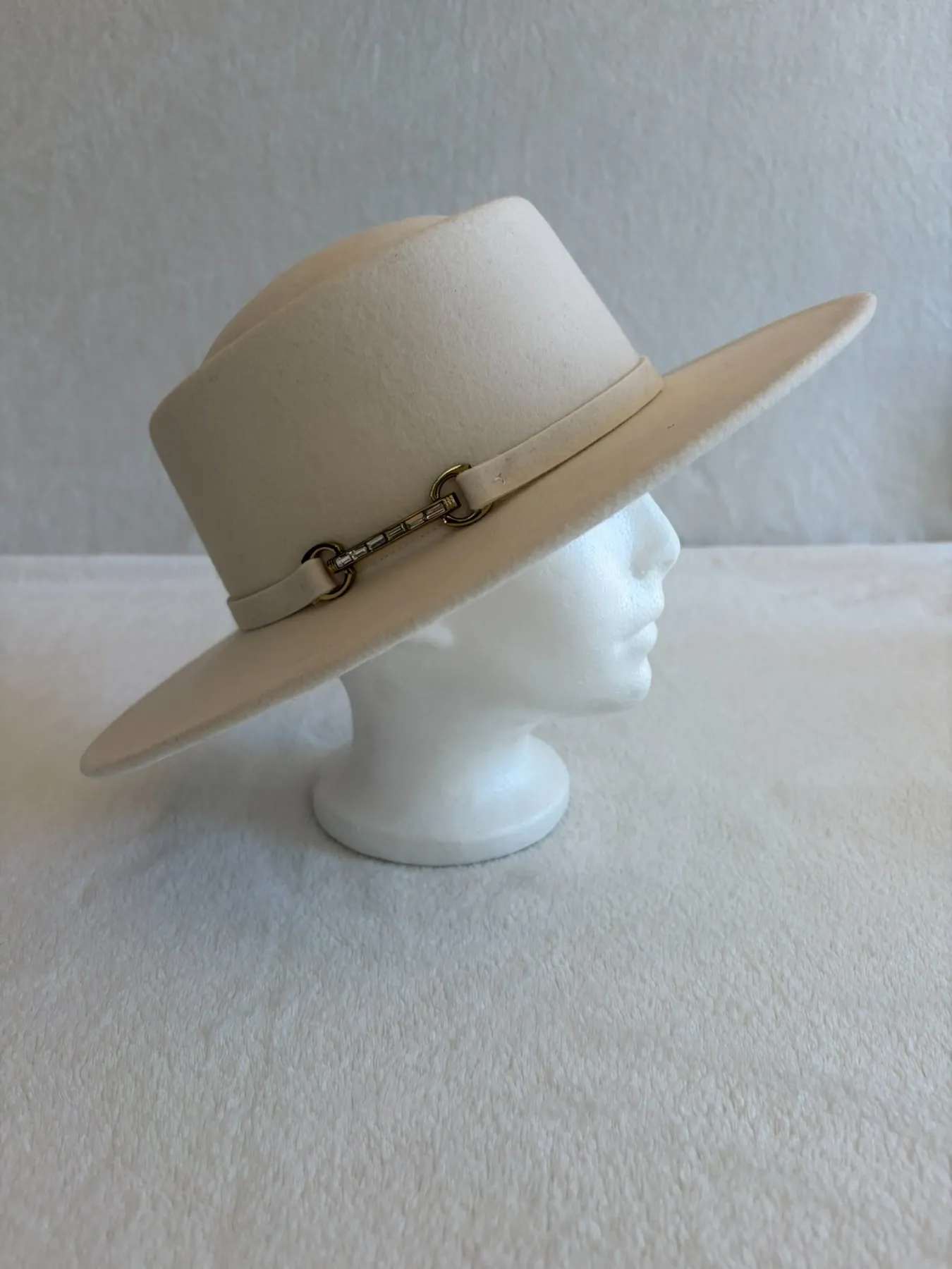A cream felt dome hat from Hats by Cherish, number 340