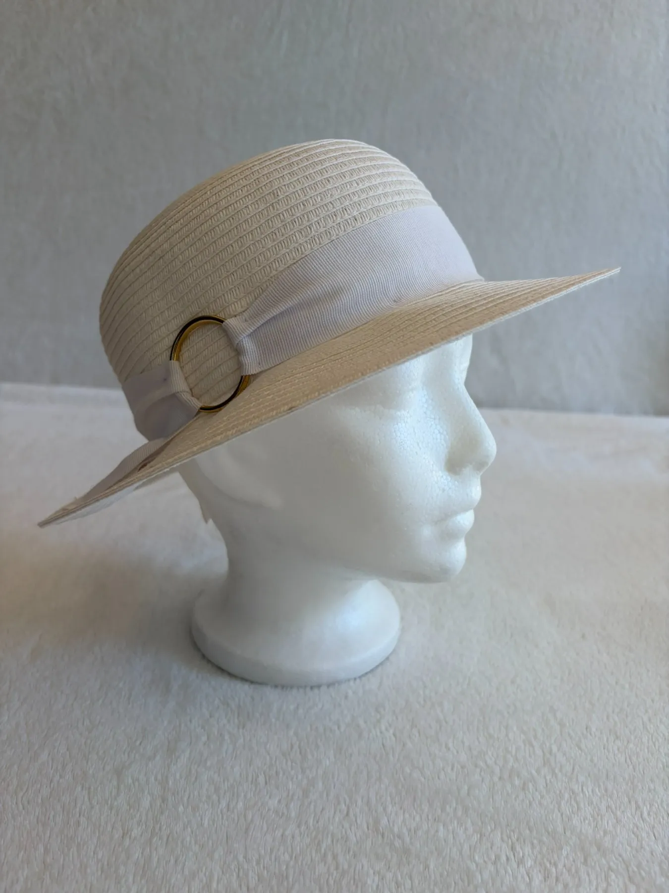 A cream straw dome hat from Hats by Cherish, number 344