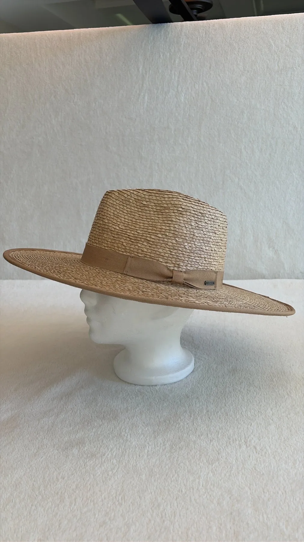 A beige and tan straw cowboy hat from Hats by Cherish, number 412