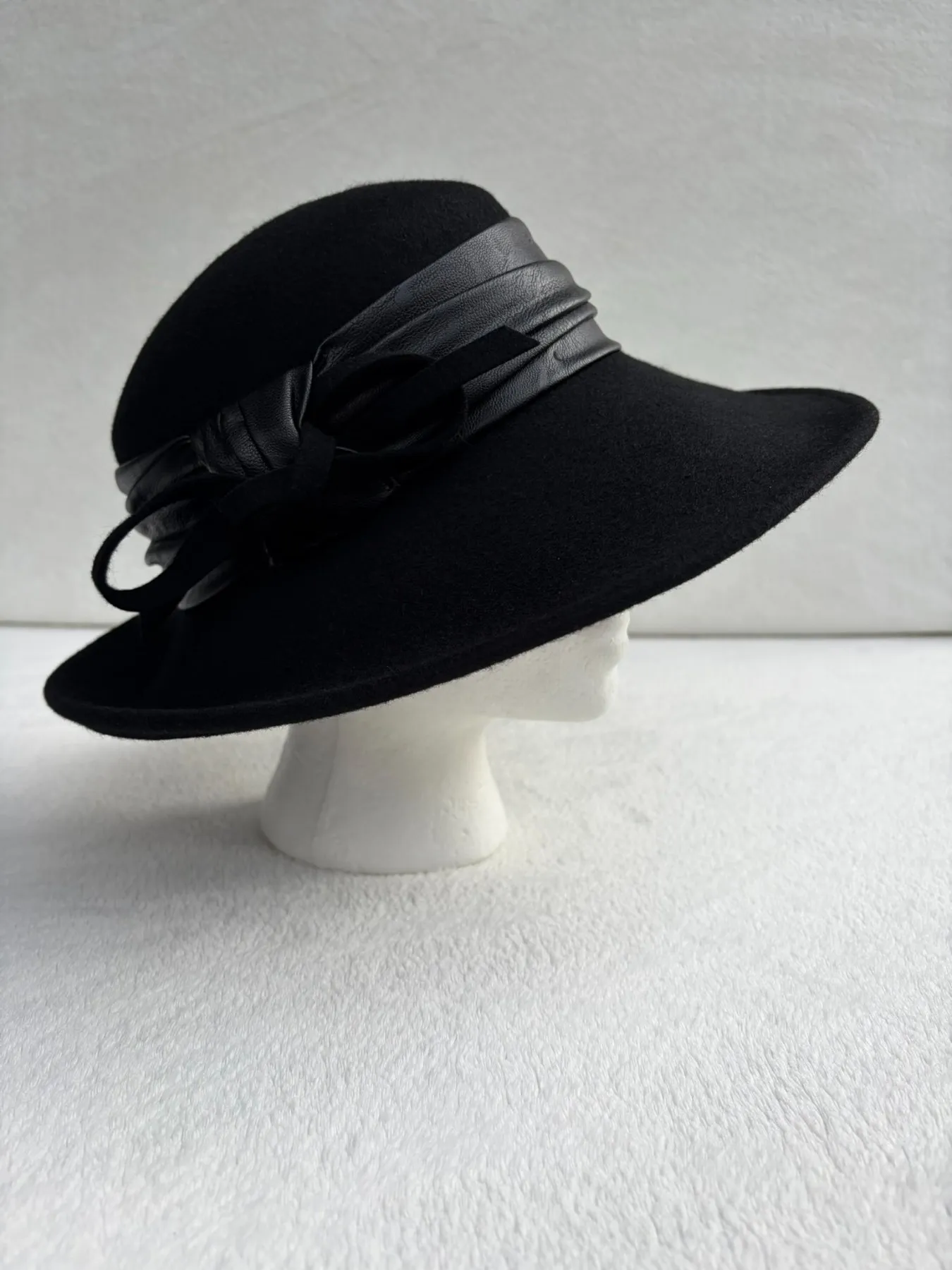 A black felt wide-brimmed hat from Hats by Cherish, number 416