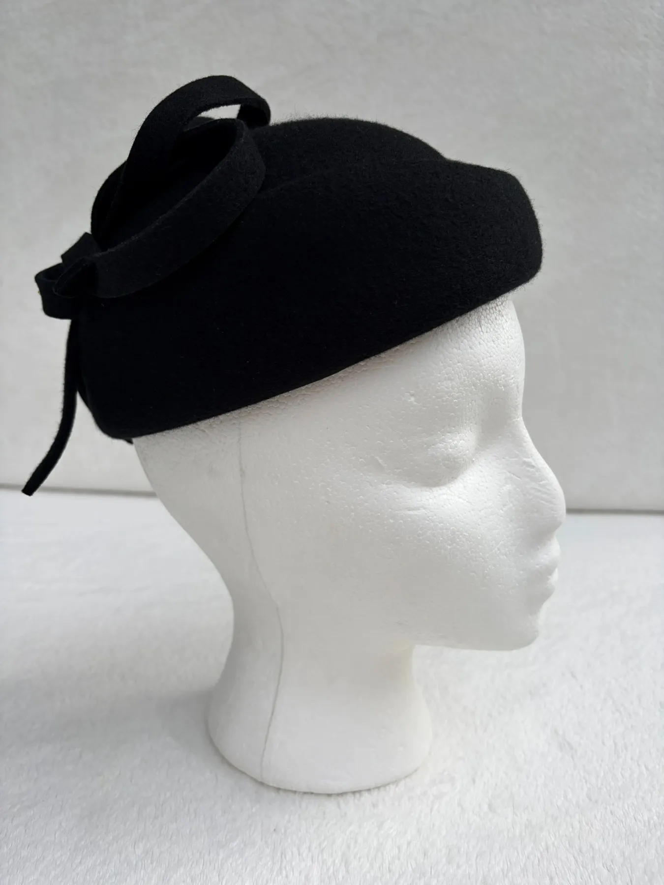 A black felt pillbox hat from Hats by Cherish, number 431