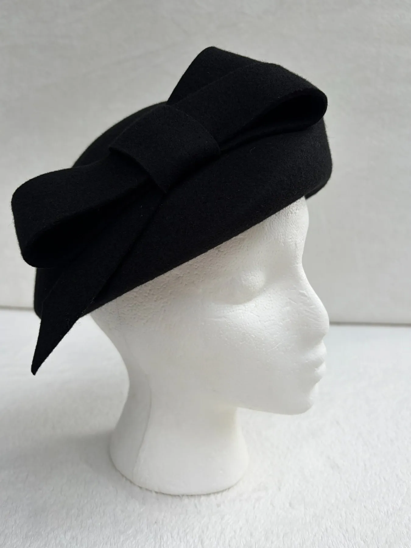 A black felt pillbox hat from Hats by Cherish, number 483