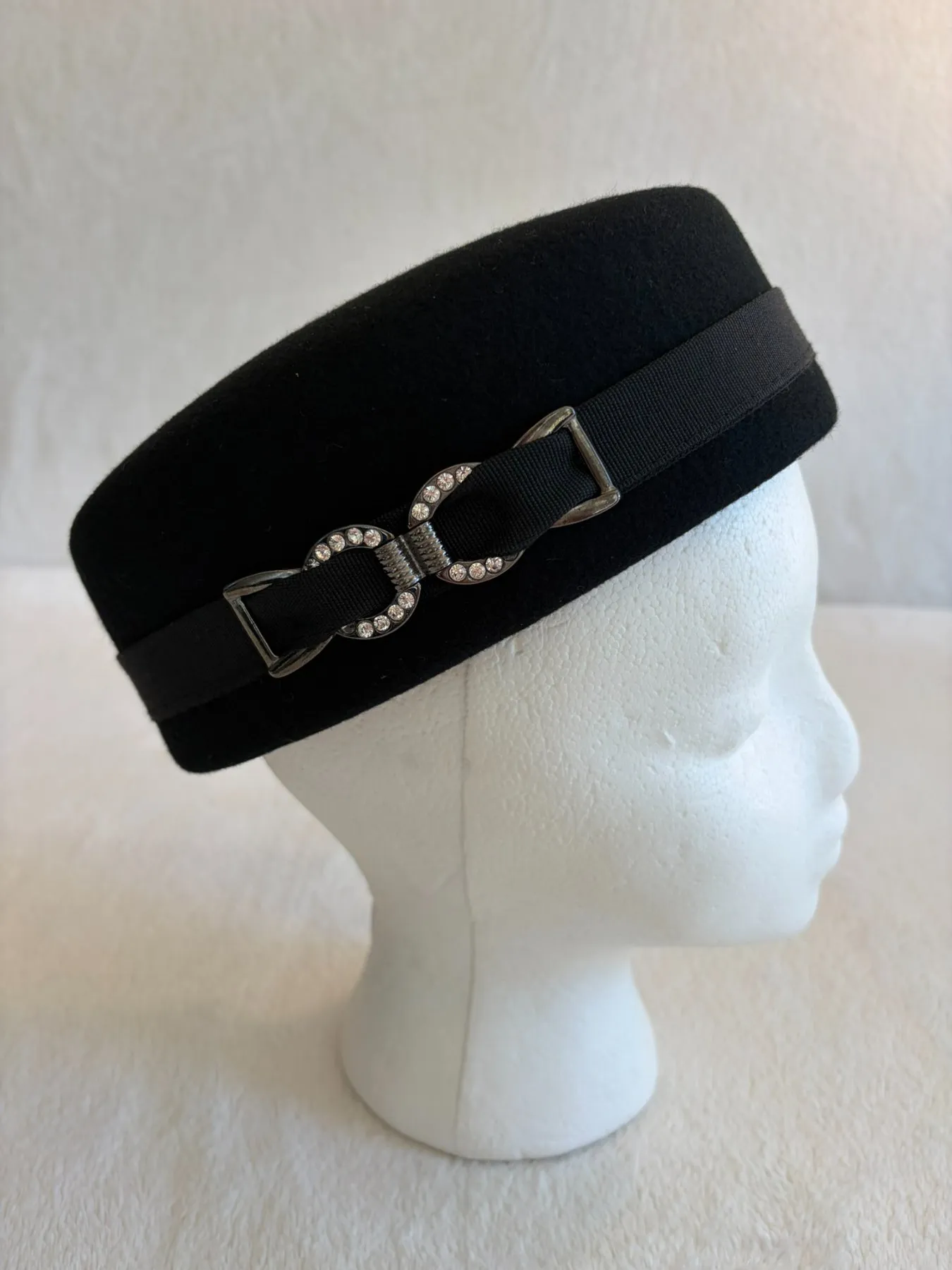 A black felt pillbox hat from Hats by Cherish, number 488