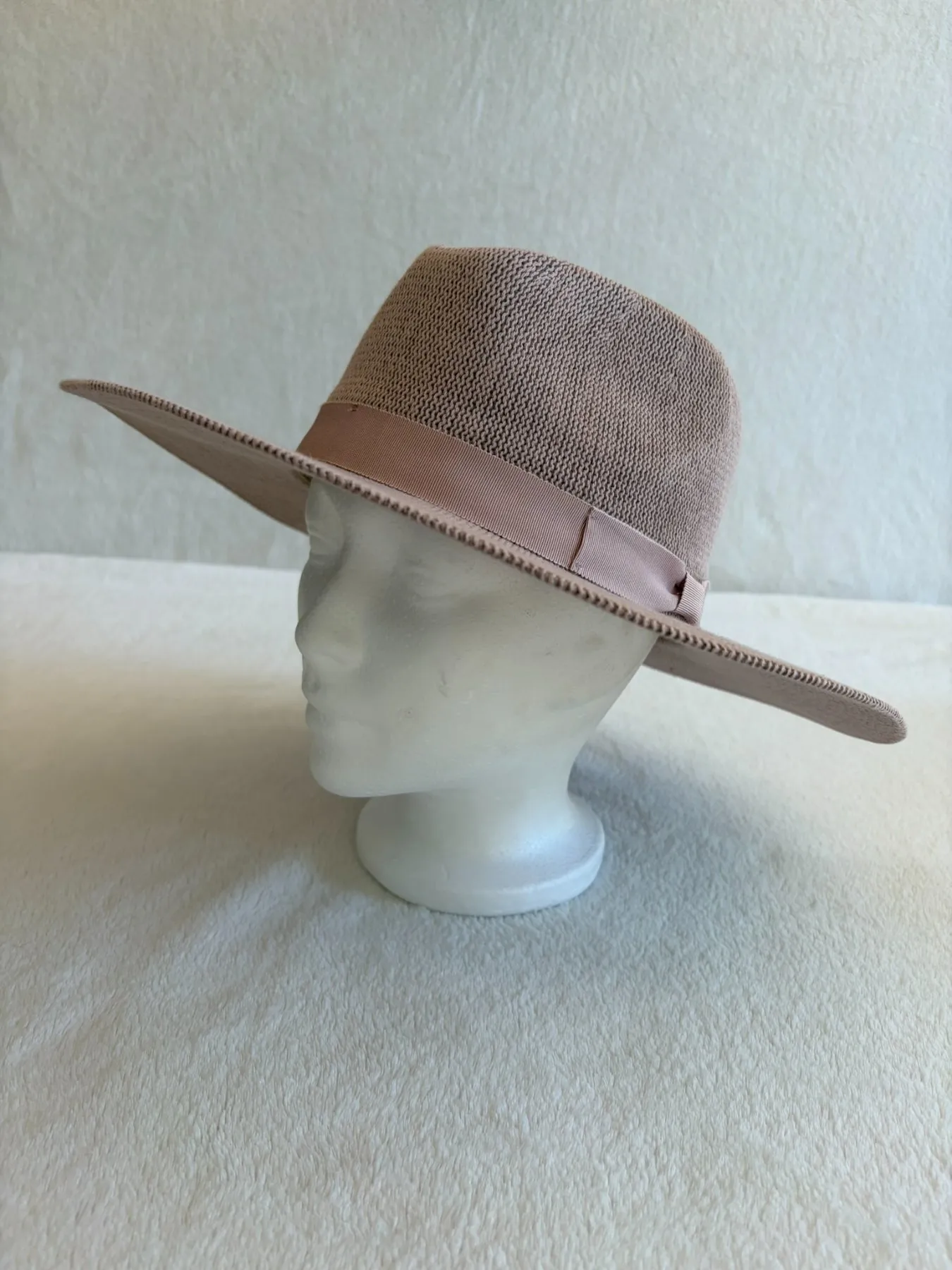 A pink cowboy hat from Hats by Cherish, number 490