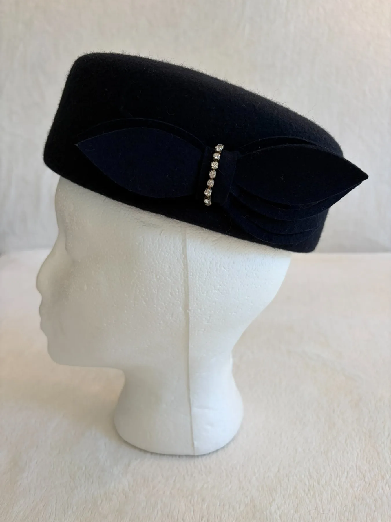 A navy felt pillbox hat from Hats by Cherish, number 539