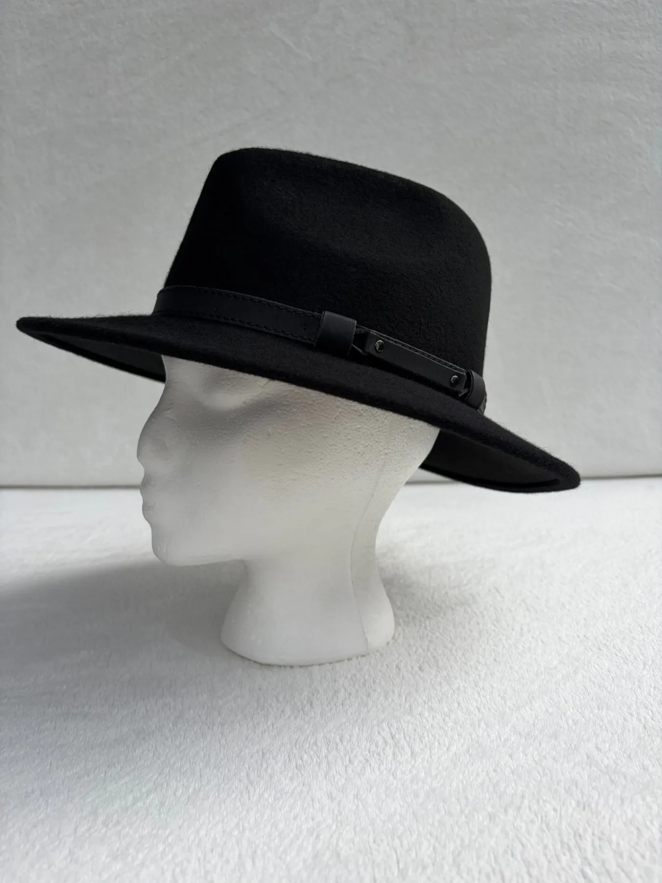 A black felt cowboy hat from Hats by Cherish, number 569