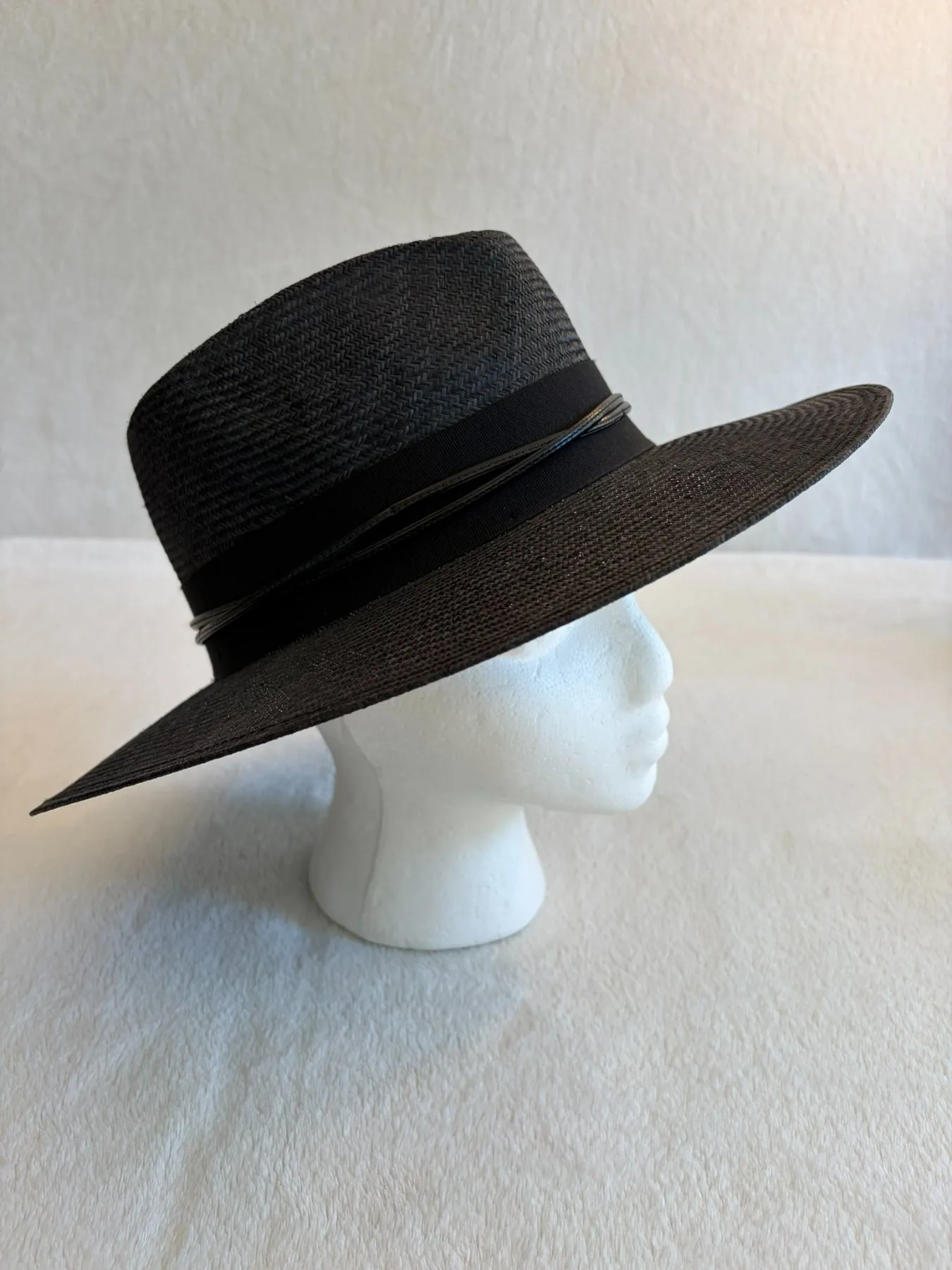 A black straw cowboy hat from Hats by Cherish, number 589