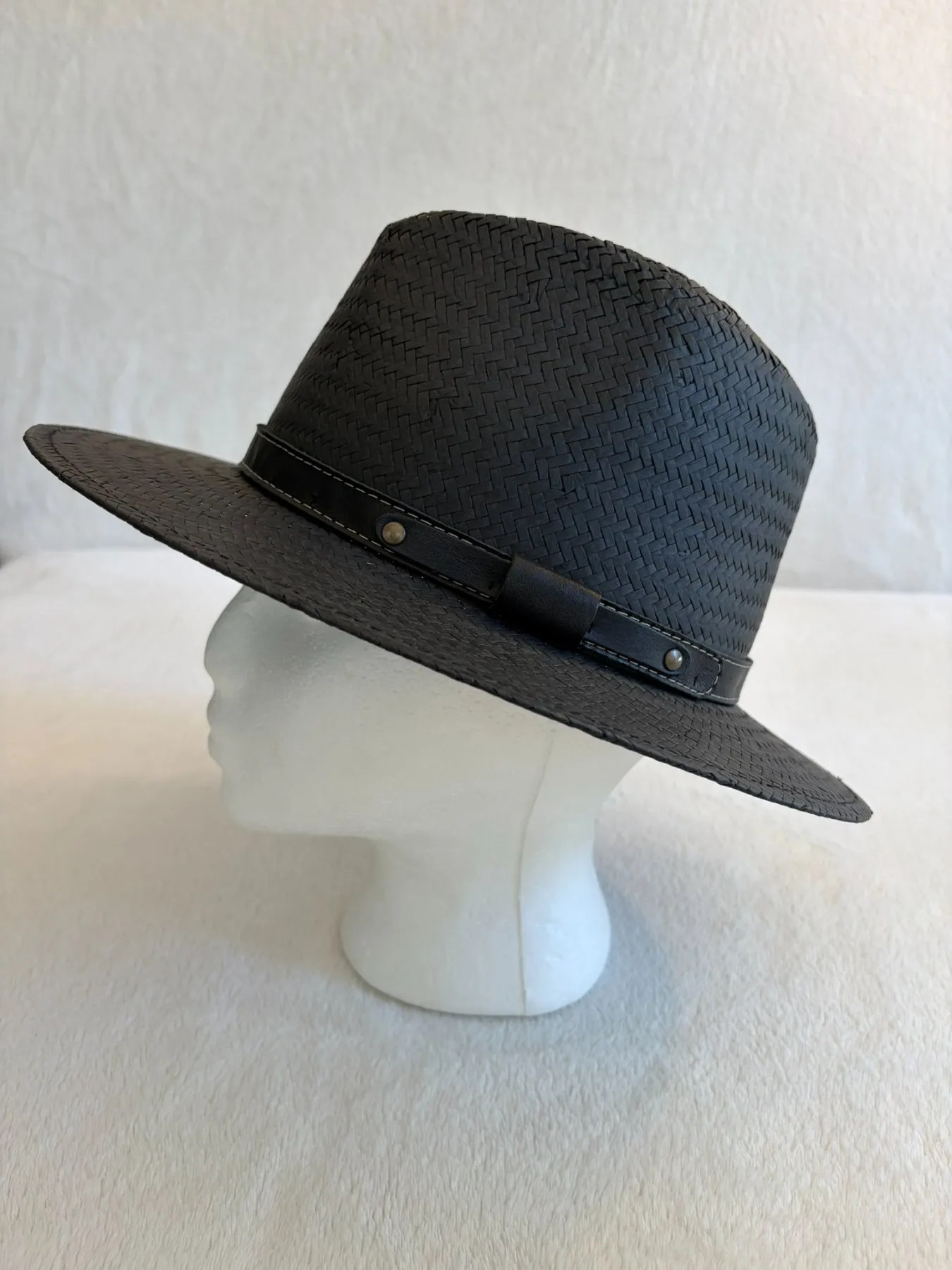 A black straw cowboy hat from Hats by Cherish, number 656