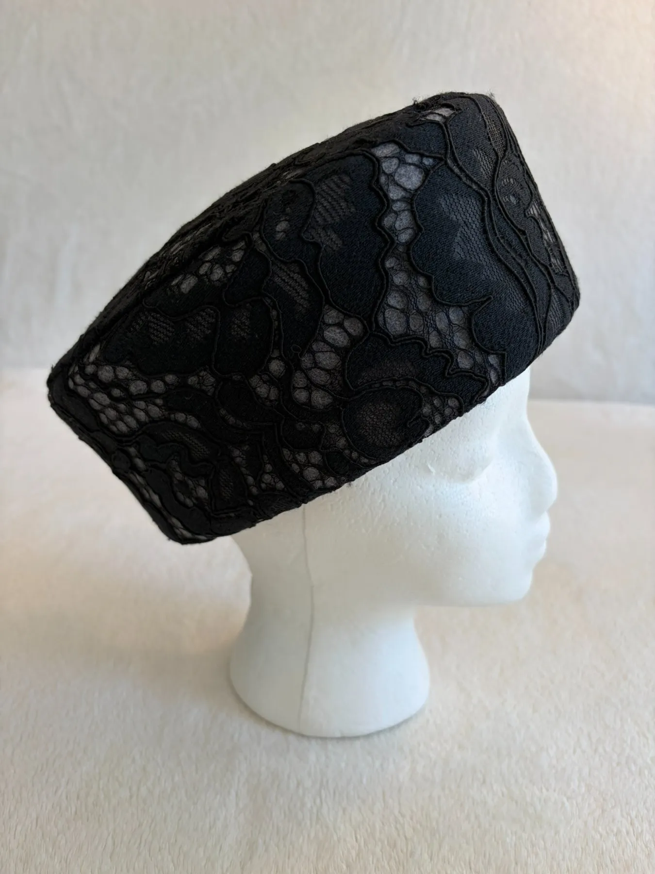 A black felt pillbox hat from Hats by Cherish, number 682