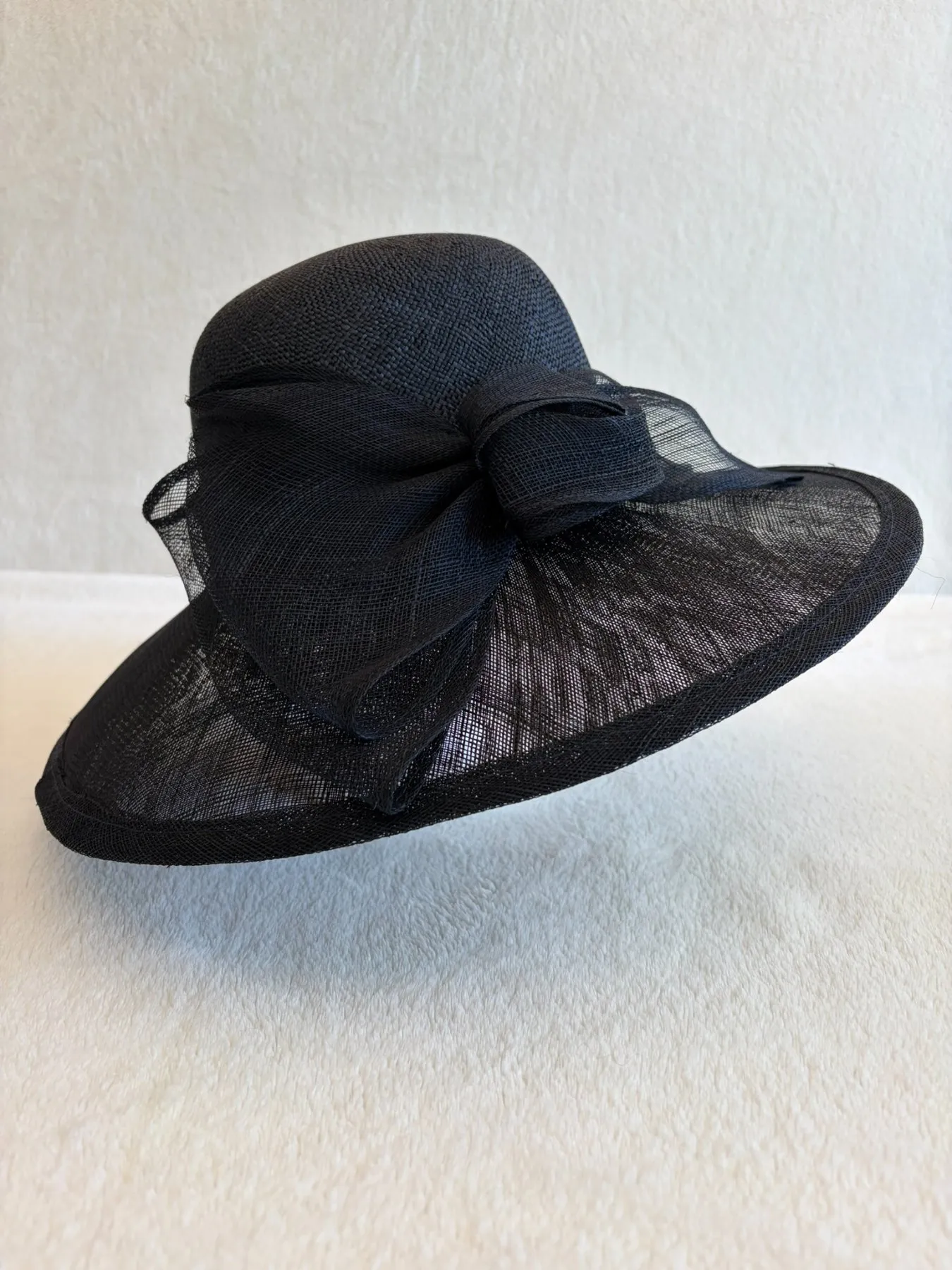 A navy straw wide-brimmed hat from Hats by Cherish, number 734