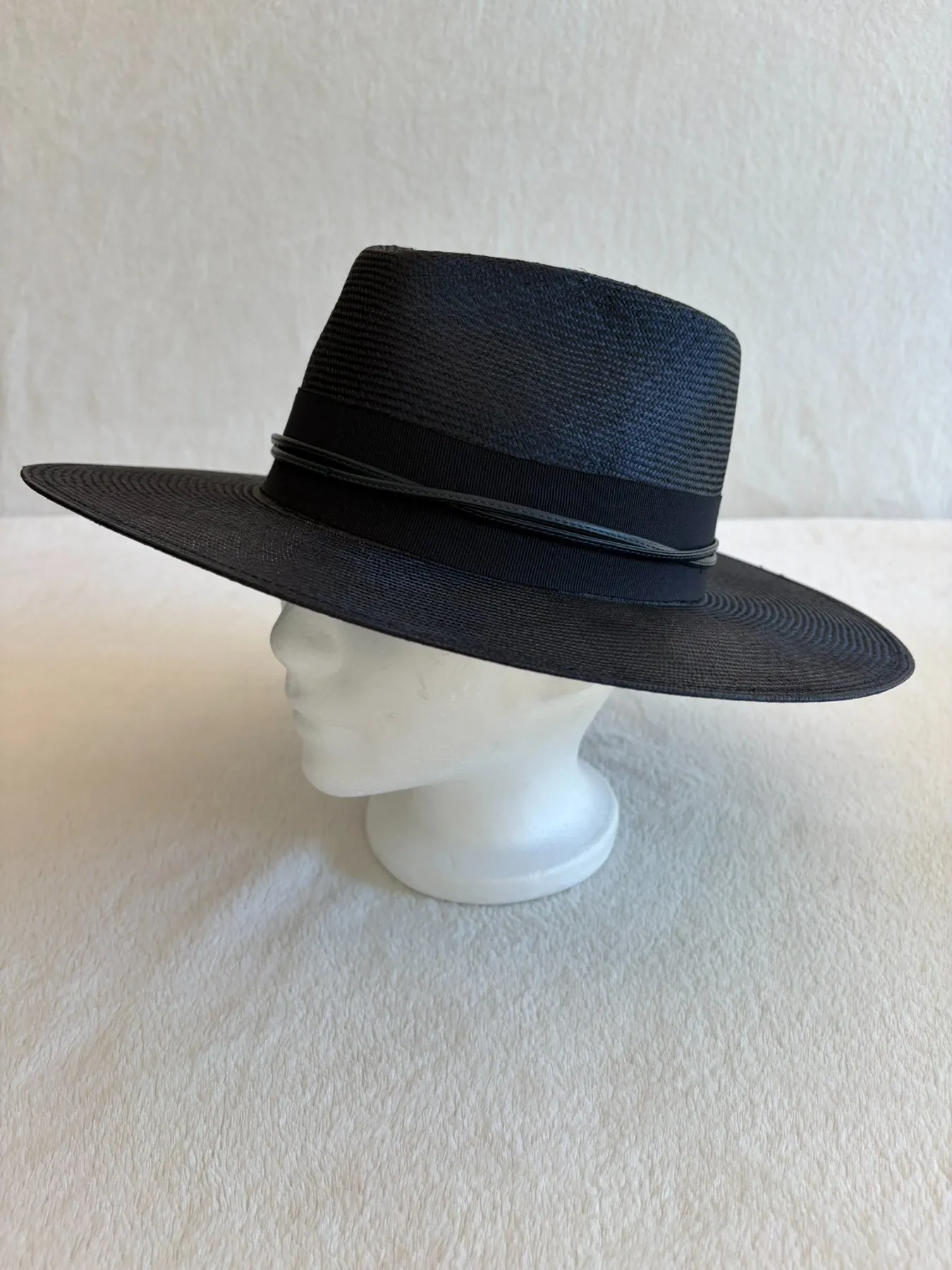 A navy straw cowboy hat from Hats by Cherish, number 748