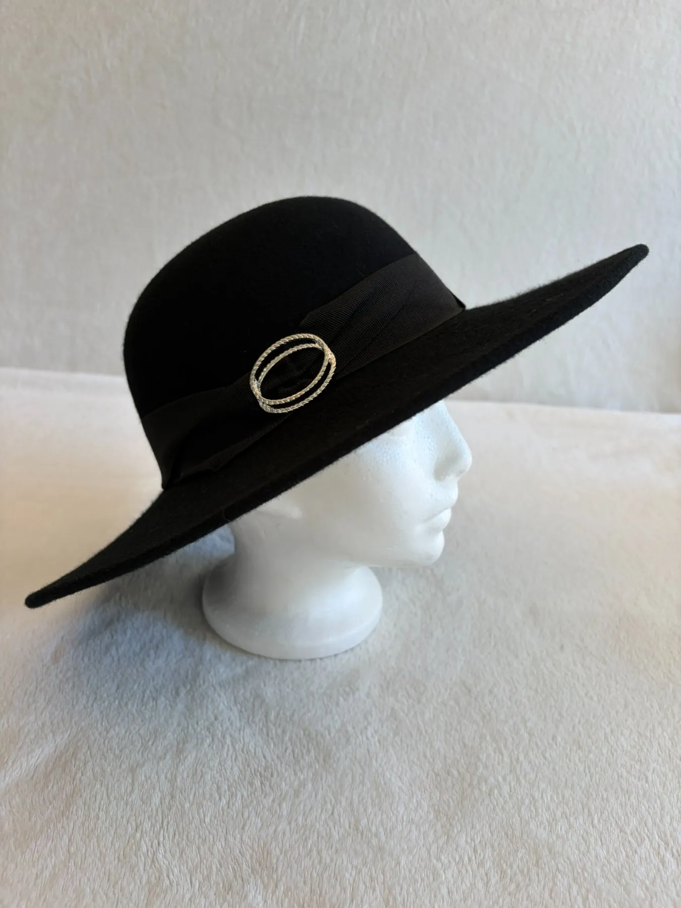 A black felt wide-brimmed hat from Hats by Cherish, number 774