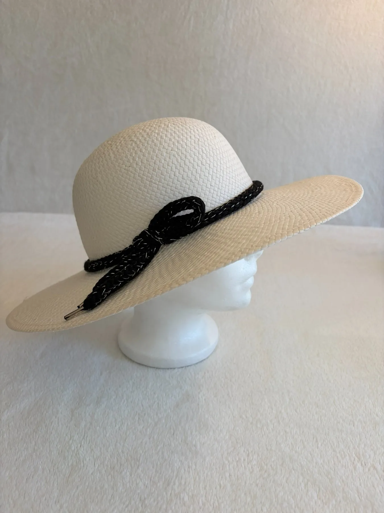 A cream straw wide-brimmed hat from Hats by Cherish, number 775