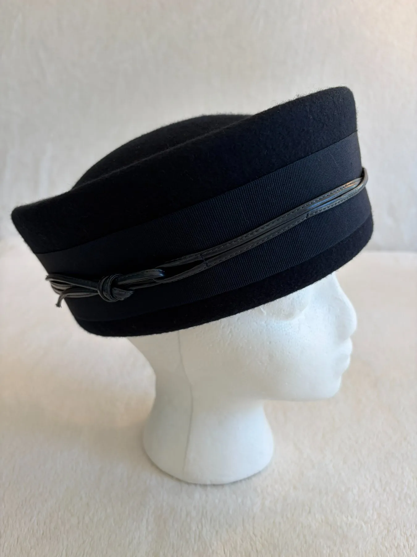 A navy felt pillbox hat from Hats by Cherish, number 783