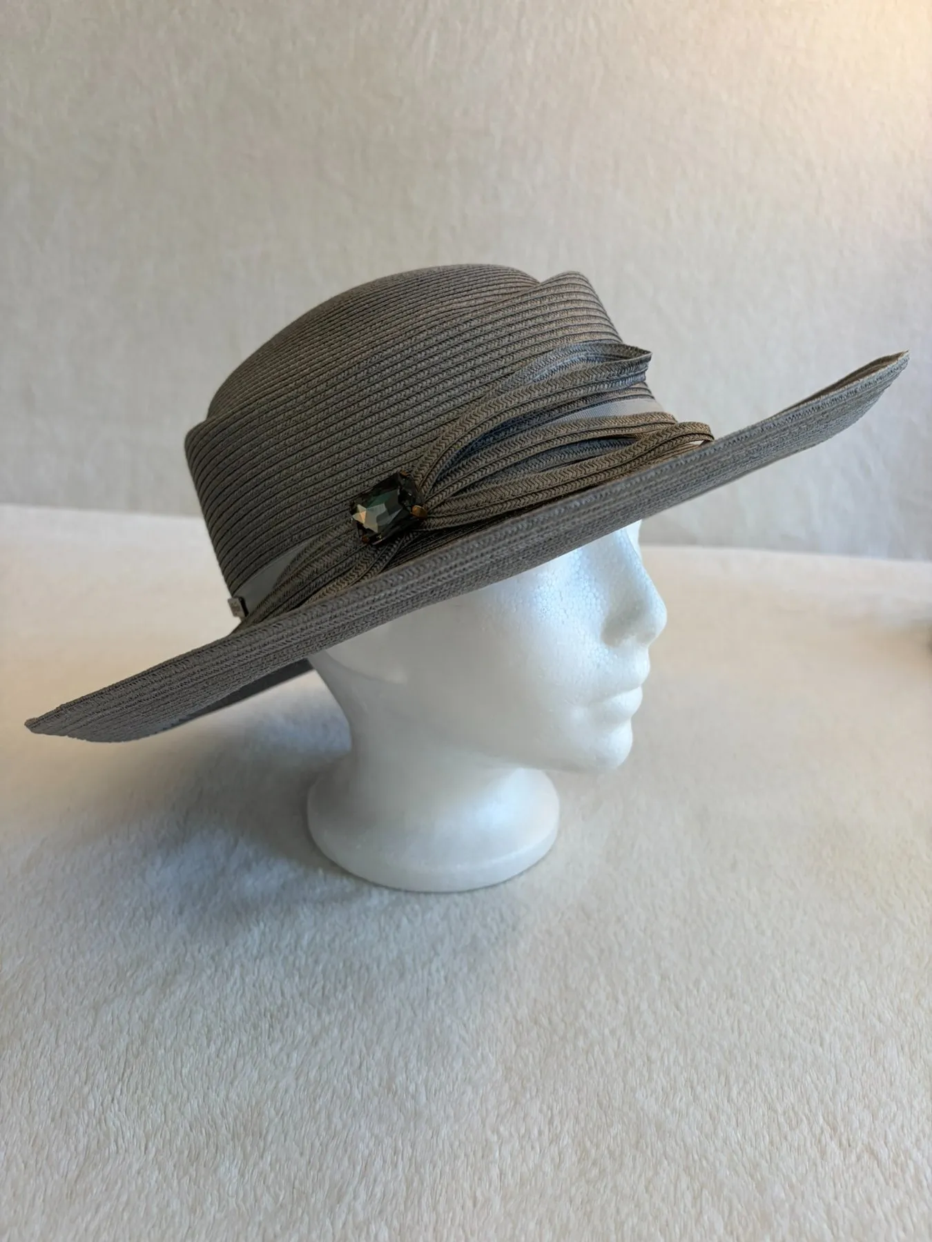 A grey straw wide-brimmed hat from Hats by Cherish, number 811