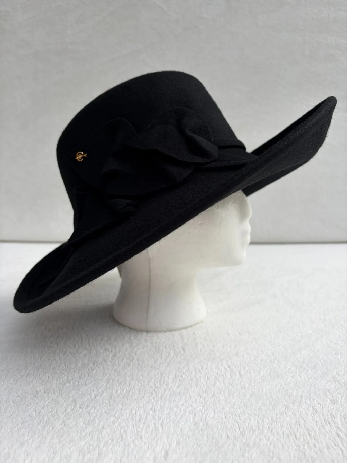 A black felt wide-brimmed hat from Hats by Cherish, number 874
