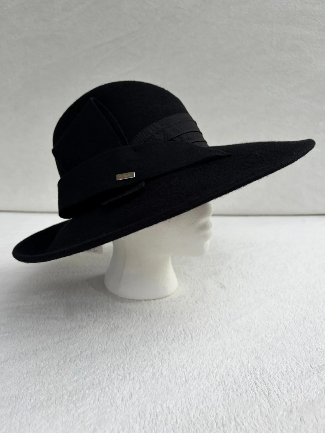 A black felt wide-brimmed hat from Hats by Cherish, number 986
