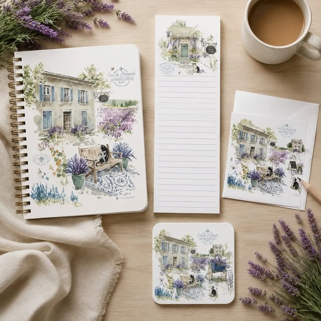 Watercolour lavender collection: notebook, magnetic list pad, notecards, and coaster styled with fresh lavender and coffee